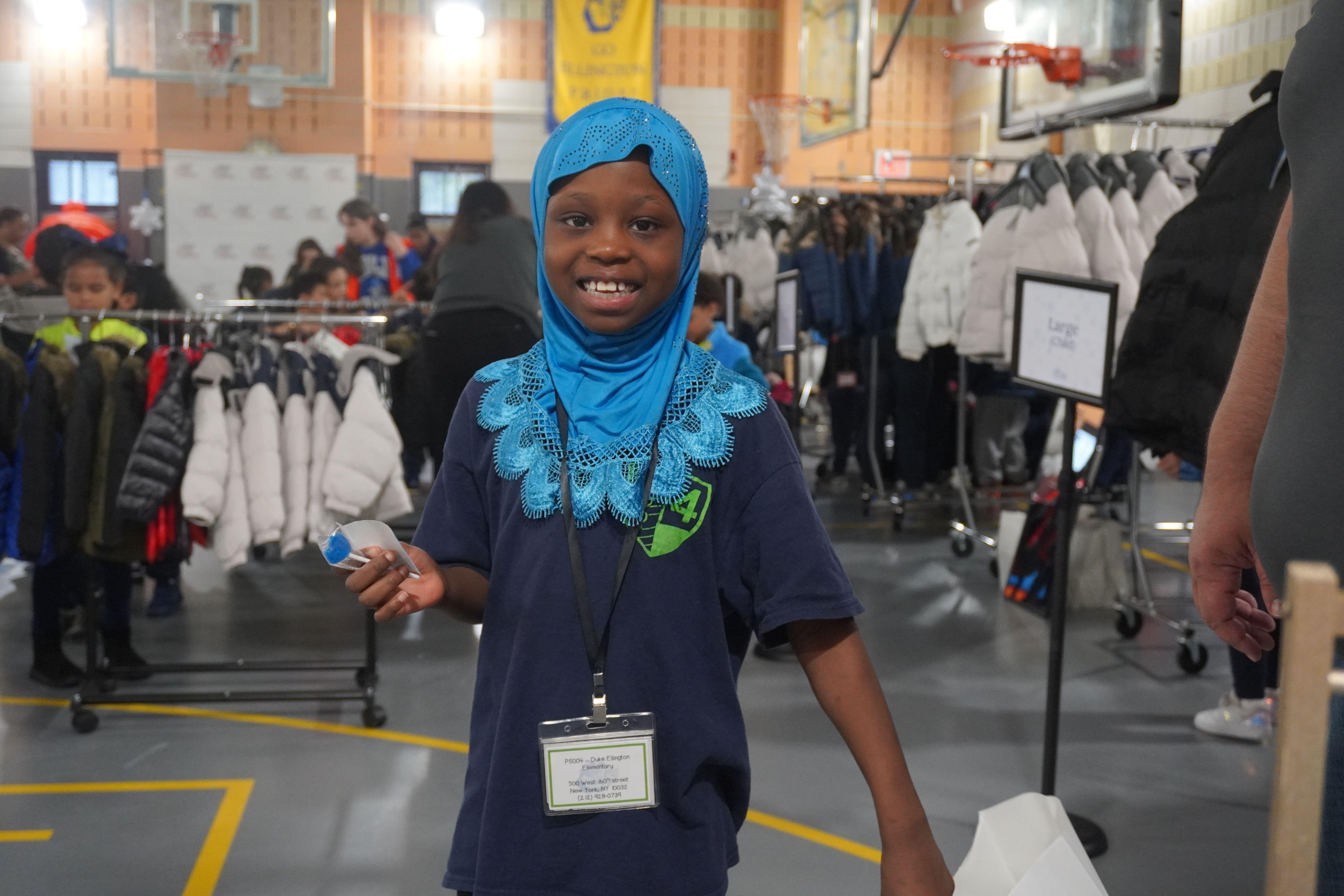 Student at Coat Drive Kickoff